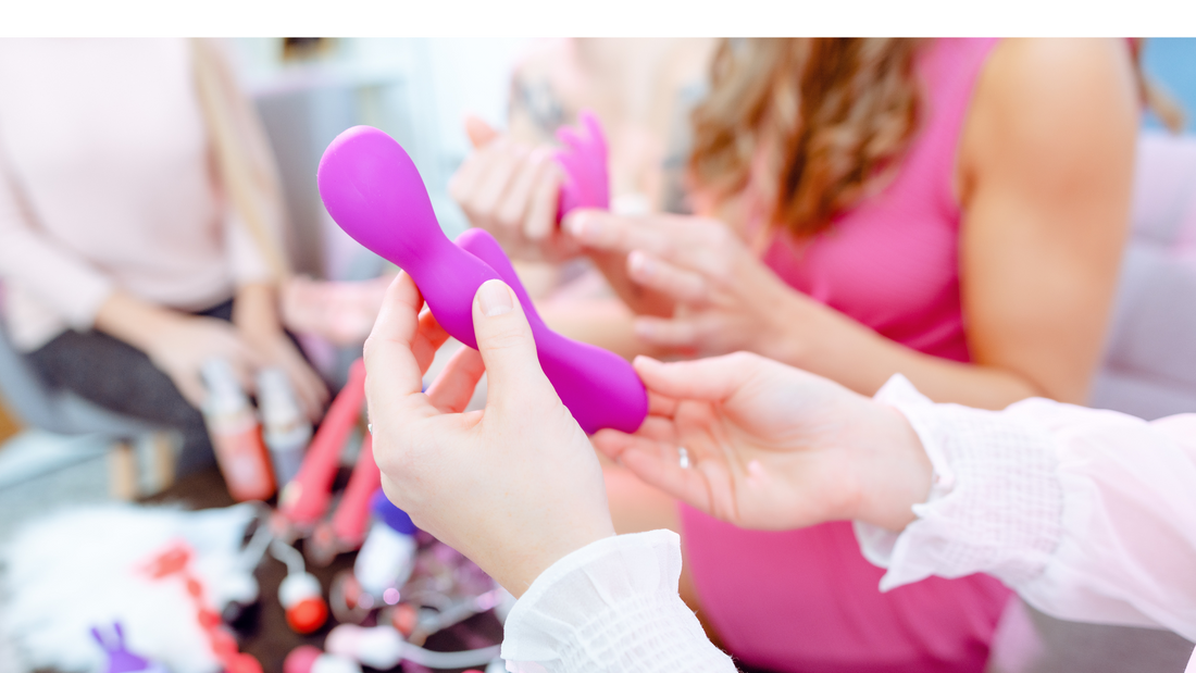 Woman holding a prostate massager for a man